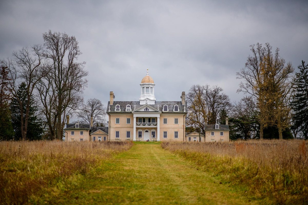 A photograph of the Hampton Mansion on a cloudy day.