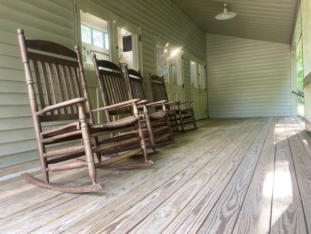 Wooden rocking chairs on a porch