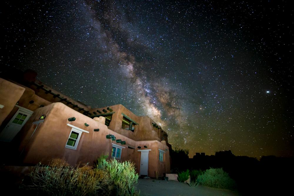 Milky Way over the historic Pueblo-Revival style inn.