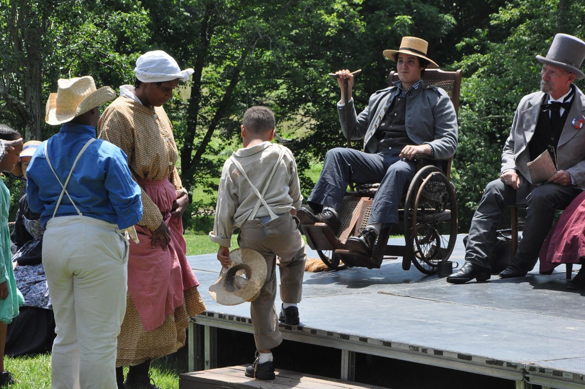 Re-enactors on stage