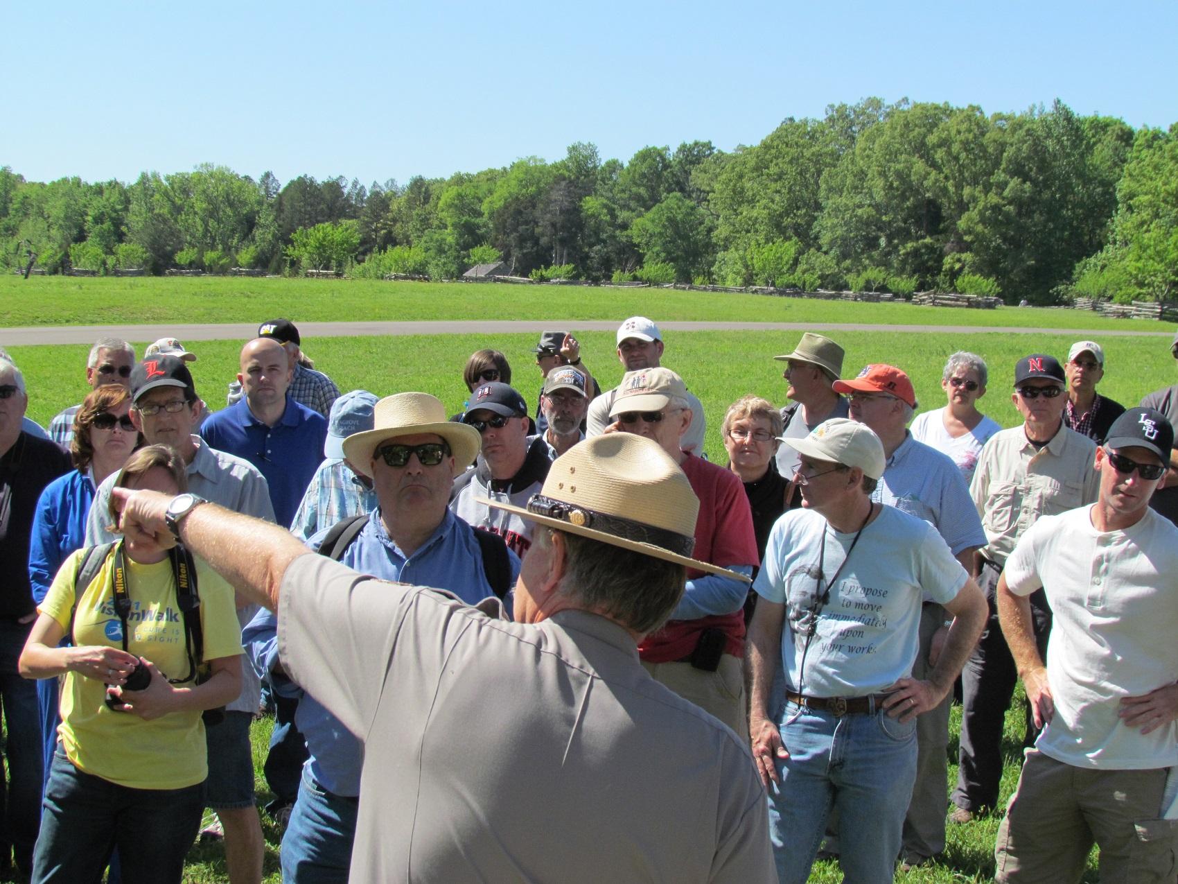 Ranger pointing while giving a tour.