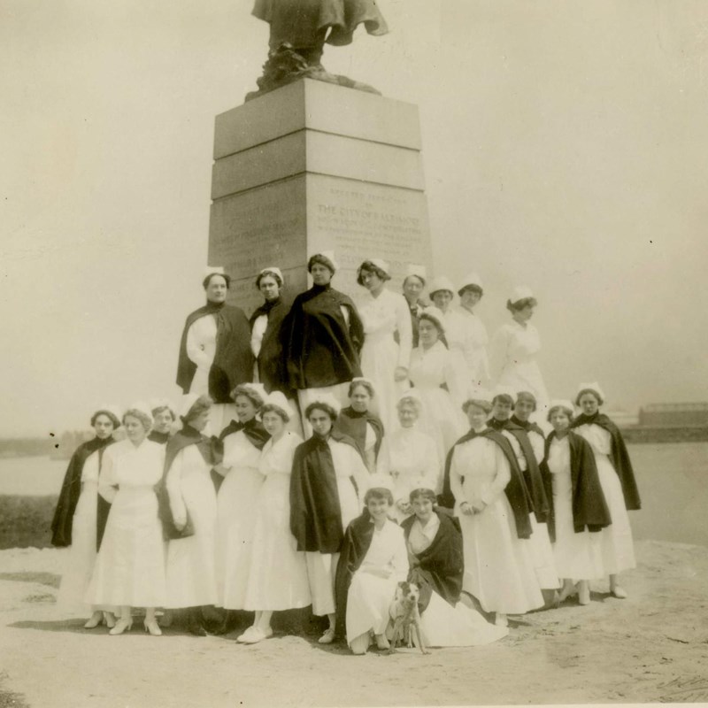 Nurses at General Hospital No. 2 gathered around Armistead Monument and Fort McHenry