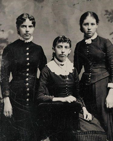 Black and white image of three young women