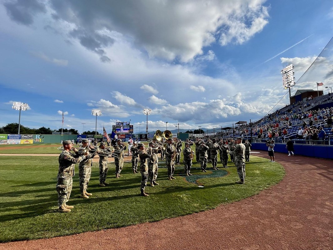 29th Infantry Division Band performing on a baseball field.
