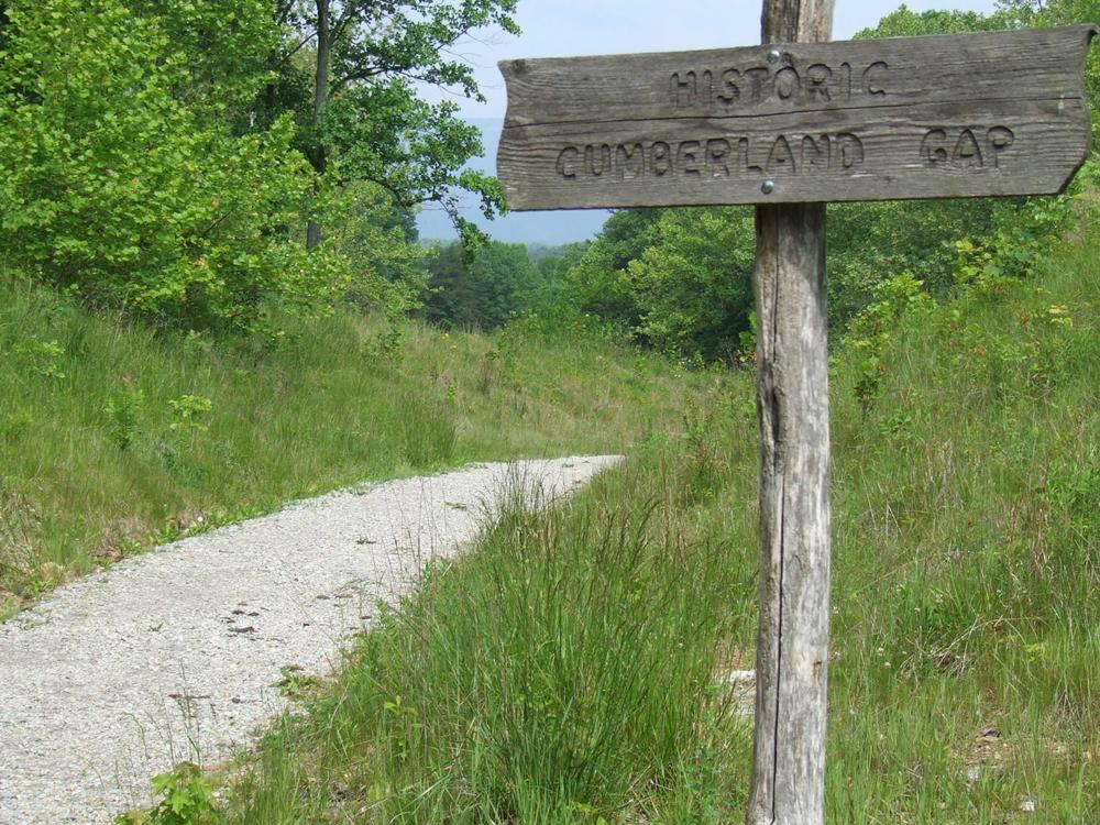An old sign that says Historic Cumberland Gap