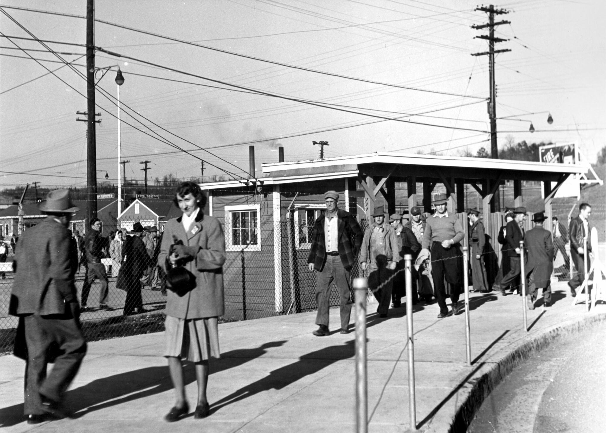 War Workers pass through a security checkpoint at K-25