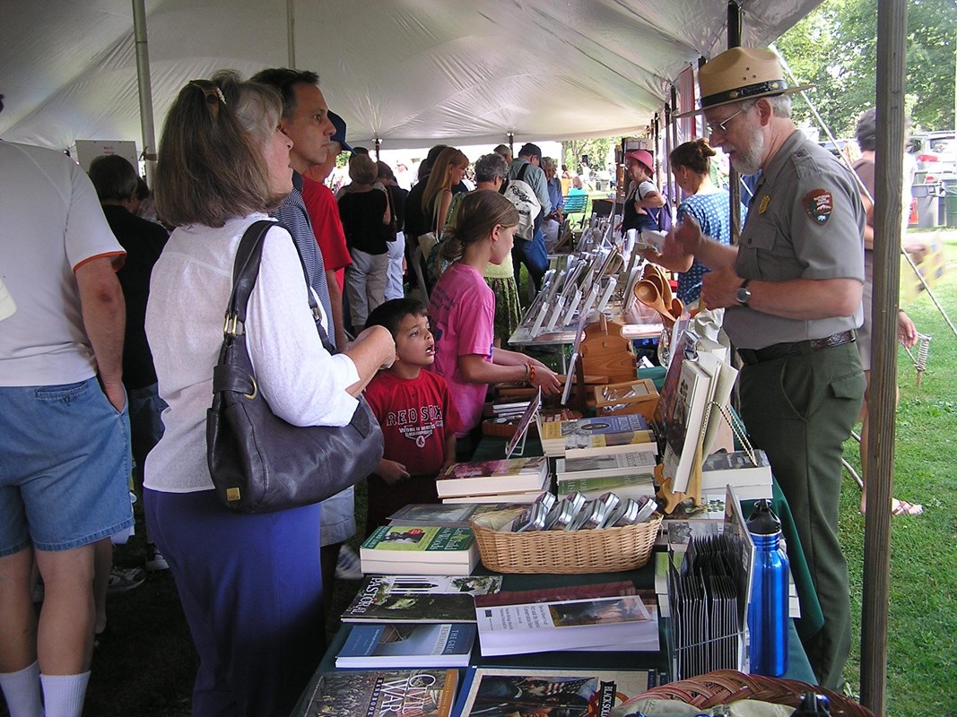 People at the Park's booth at Bookstock on the Green