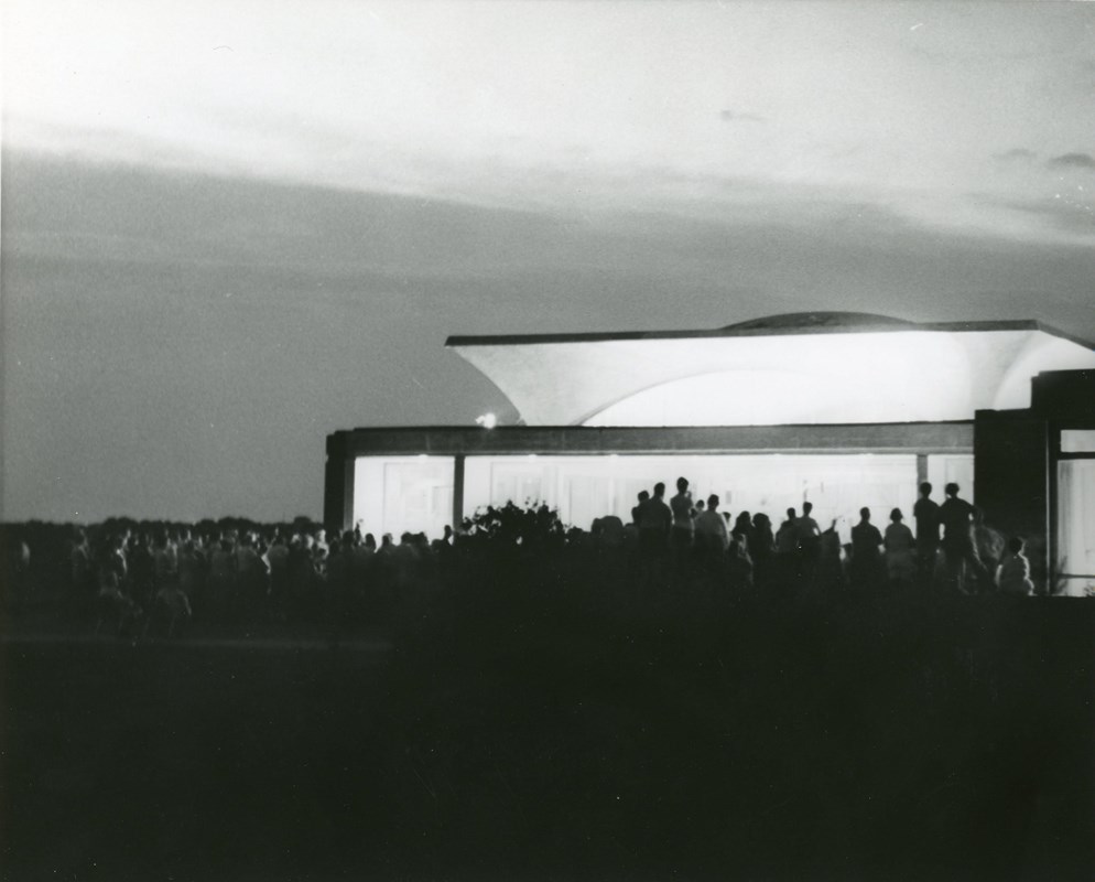 Public watching the broadcast of the Apollo 11 Moon Landing at the visitor center in 1969