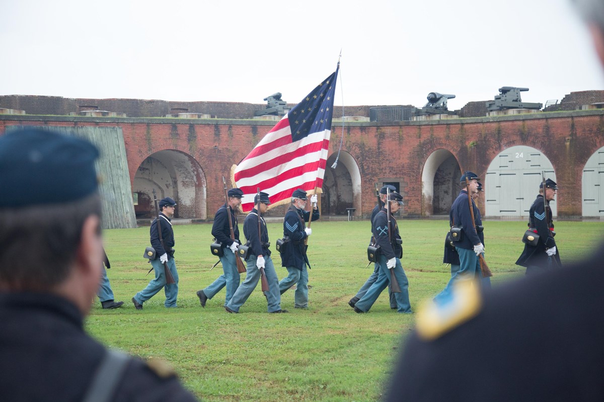 Union soldiers parade inside Fort Pulaski
