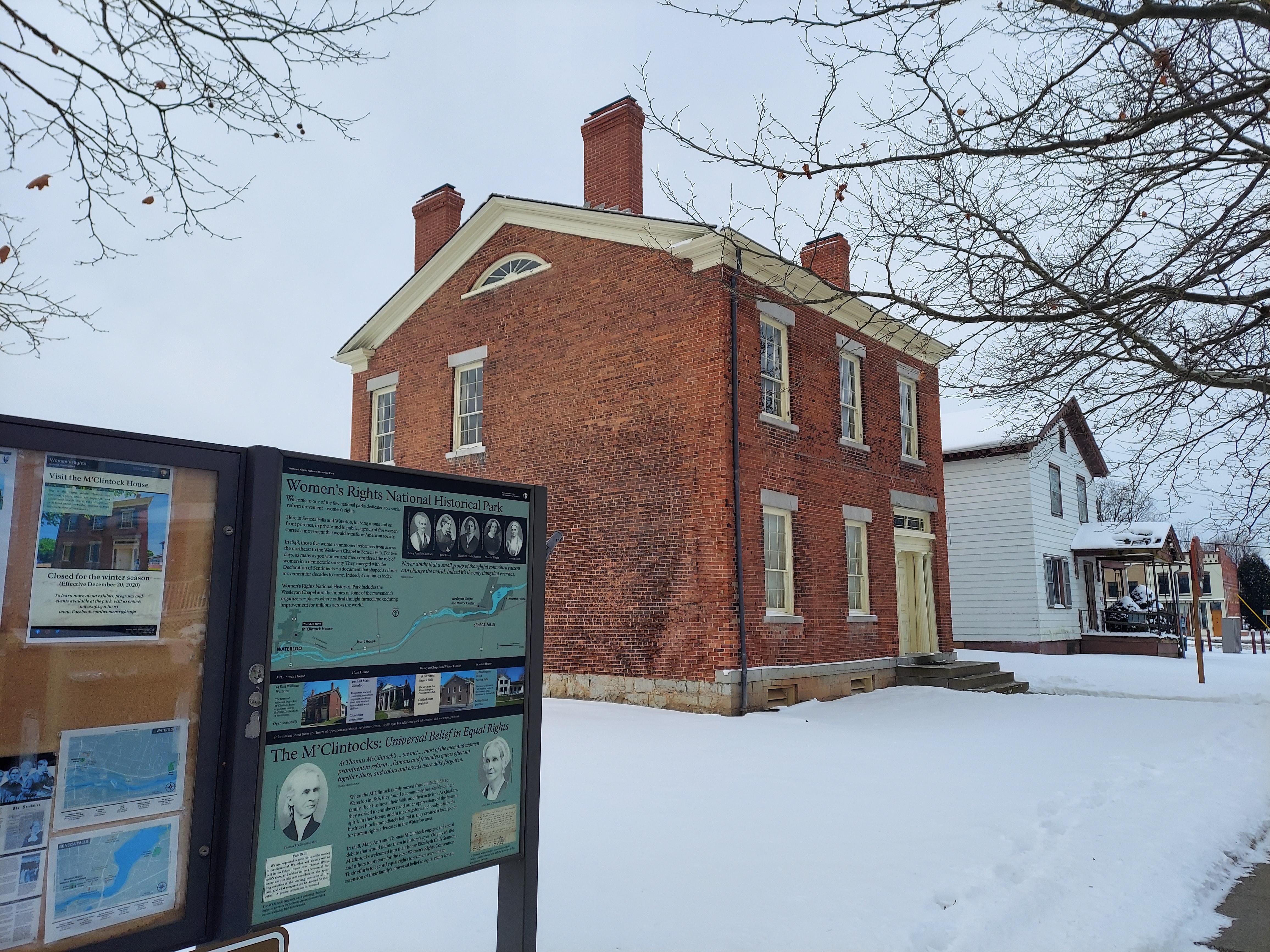 Red brick house in the snow