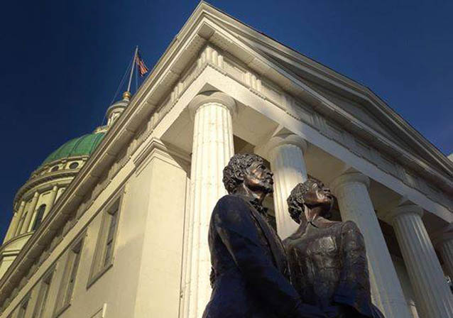 The statue of Dred and Harriet Scott in front of the Old Courthouse The statue of Dred and Harriet Scott in front of the Old Courthouse