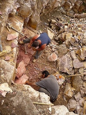 Picture of two quarriers working at extracting pipestone from the earth Picture of two quarriers working at extracting pipestone from the earth