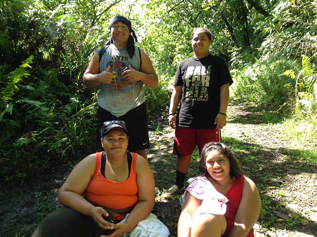 Hiker group posing along the Mount 'Alava Trail Hiker group posing along the Mount 'Alava Trail