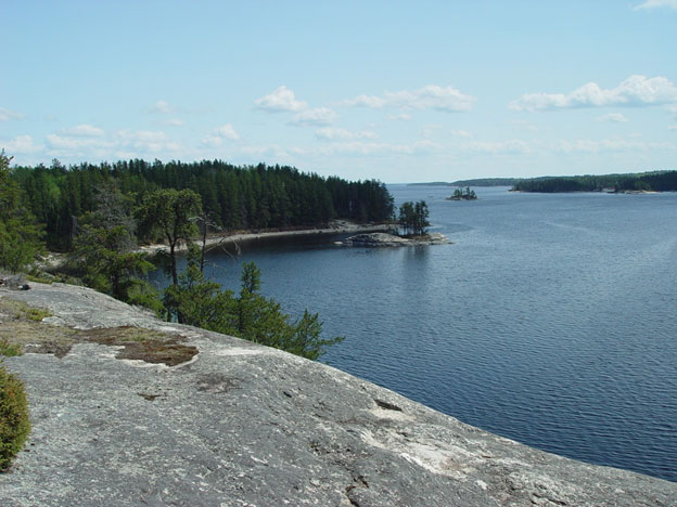 Overlooking the blue waters of Rainy Lake from a granite bluff Overlooking the blue waters of Rainy Lake from a granite bluff