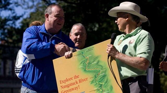 John Monroe Presents Naugatuck River Greenway Poster To Waterbury Mayor O’Leary