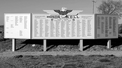 Black and white image of Honor Roll exhibit, a guide to help you access family records at Minidoka.