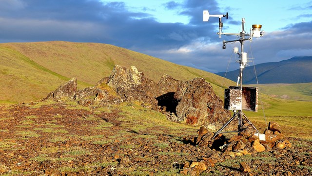 Weather monitoring equipment set up in national park.