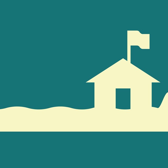 Blue box with white icon of a ranger station with a flag