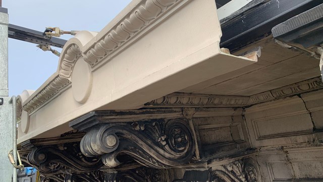 photo of installation of a metal replacement cornice