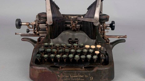 Worn black metal manual typewriter