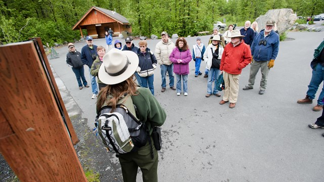 A ranger talks to park visitors in Kenai Fjords National Park