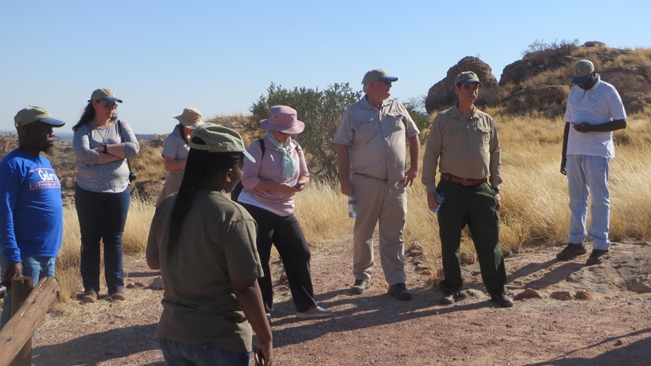 Chief Archaeologist Stan Bond reviews an archaeological site in South Africa. 