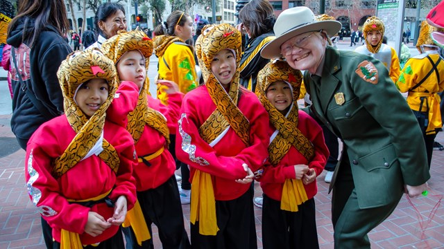 Girls posing with NPS ranger Courtesy of the NPS. 