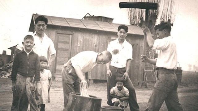 Japanese American Munemitsu family at their family farm.