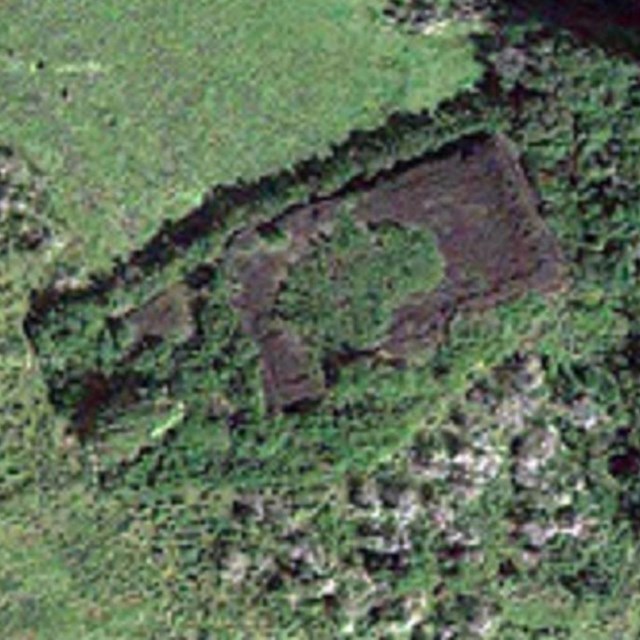 Aerial view of Loaloa Heiau on the fields  above the lower end of Manawainui Valley