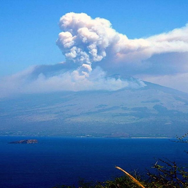 Photo of erupting volcano with smoke. NPS photo. 