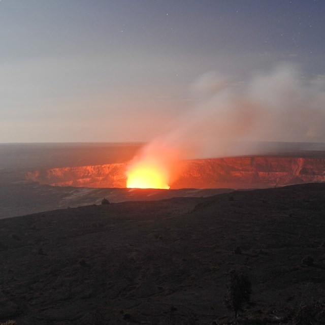 View of Halema‘uma‘u from Jaggar Museum Overlook as darkness falls