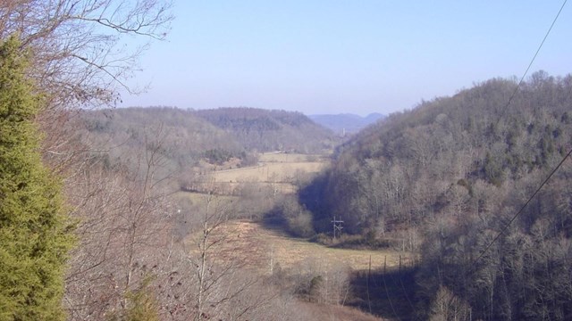 grassy field, overlook