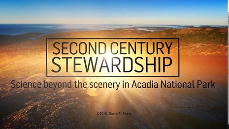 A landscape view of mountains and ocean with text "Second Century Stewardship"
