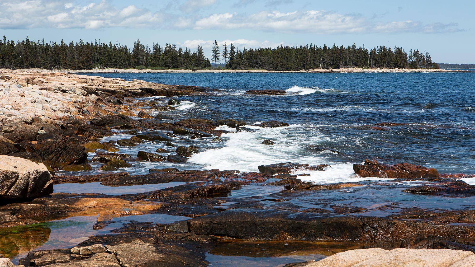 Rugged coastline with waves at Acadia National Park