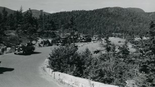 Historic photo of cars on a scenic road