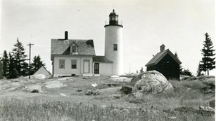 Historic photograph of a lighthouse on an island