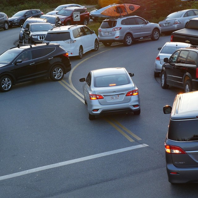 Helicopter view of packed parking lot at the summit of Cadillac Mountain