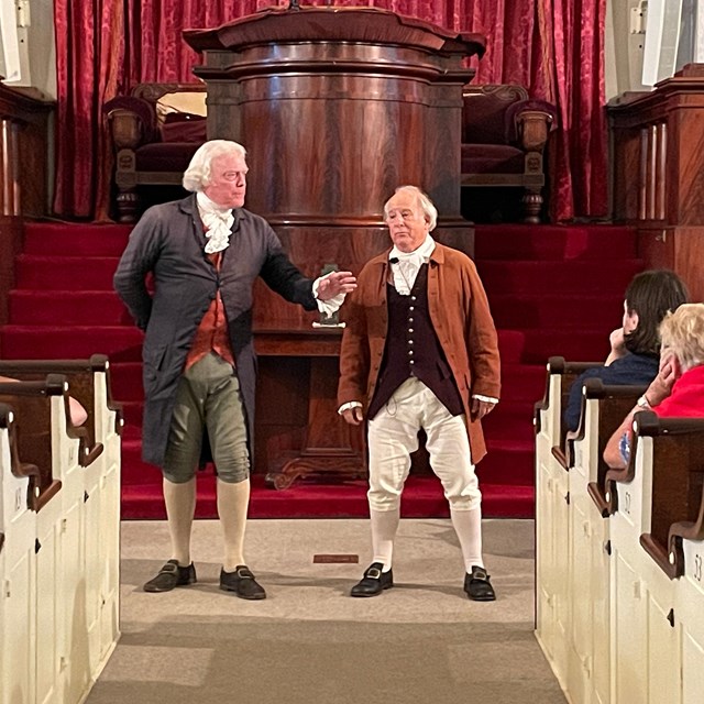 Actors portraying Thomas Jefferson and John Adams in the United First Parish Church