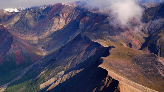 a colorful mountain ridge shot from above