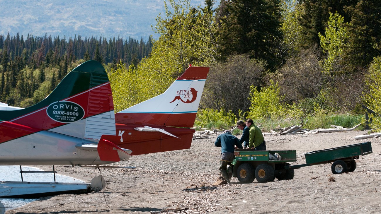 concessionaire groups load equipment onto planes in Lake Clark National Park
