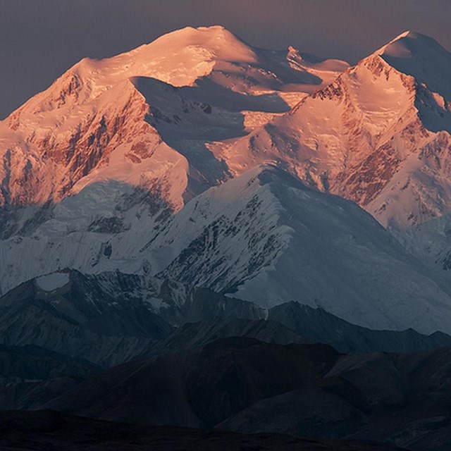 Denali mountain with pink sunset lighting