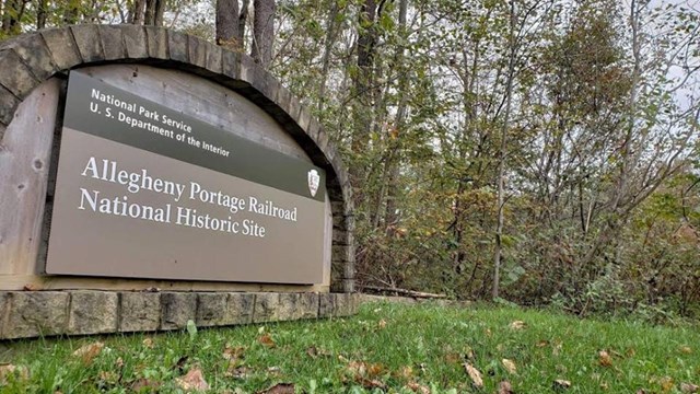 The park entrance sign with the park name.