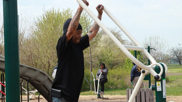 A man uses an exercise machine