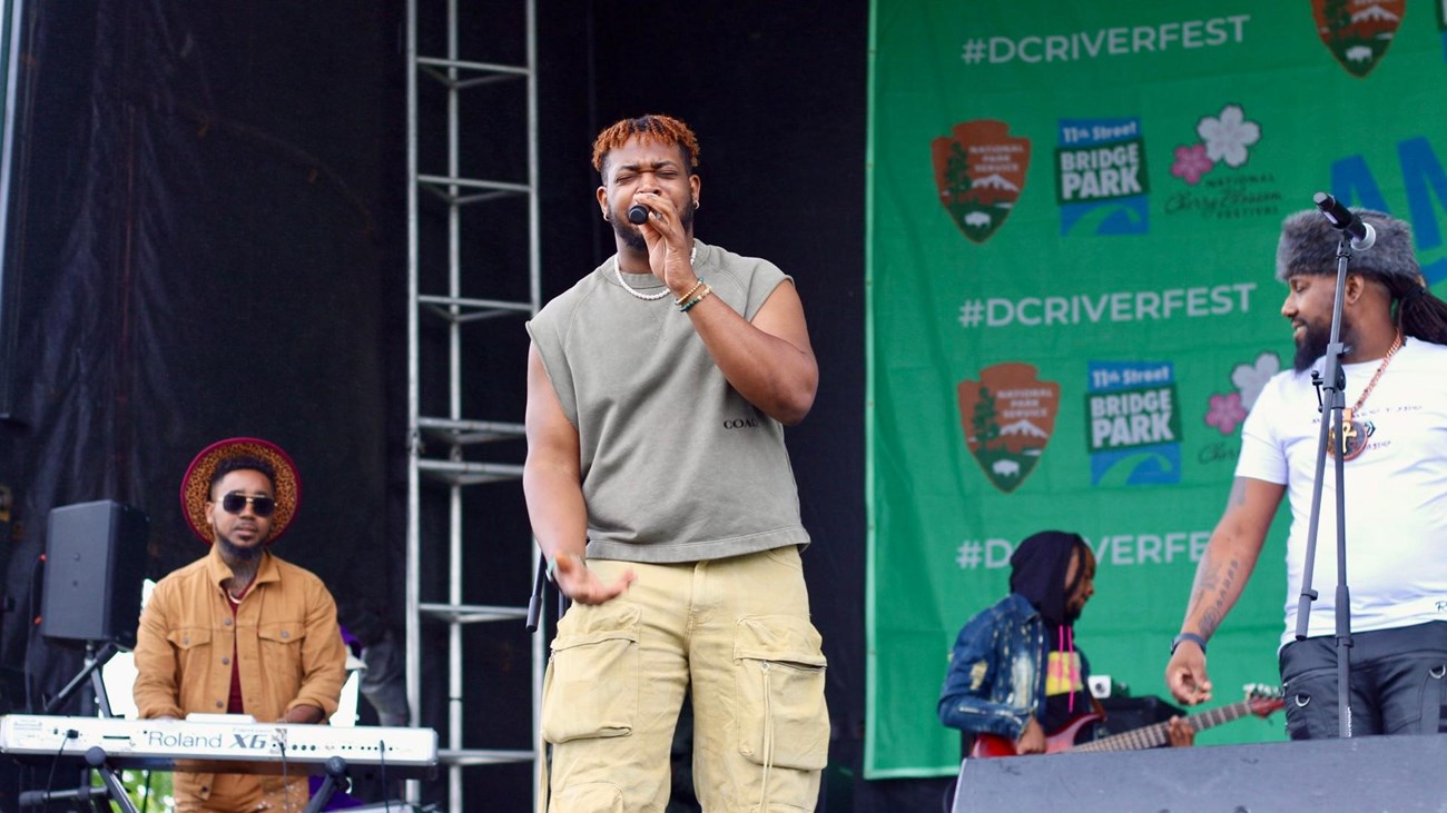 singer performing on a stage