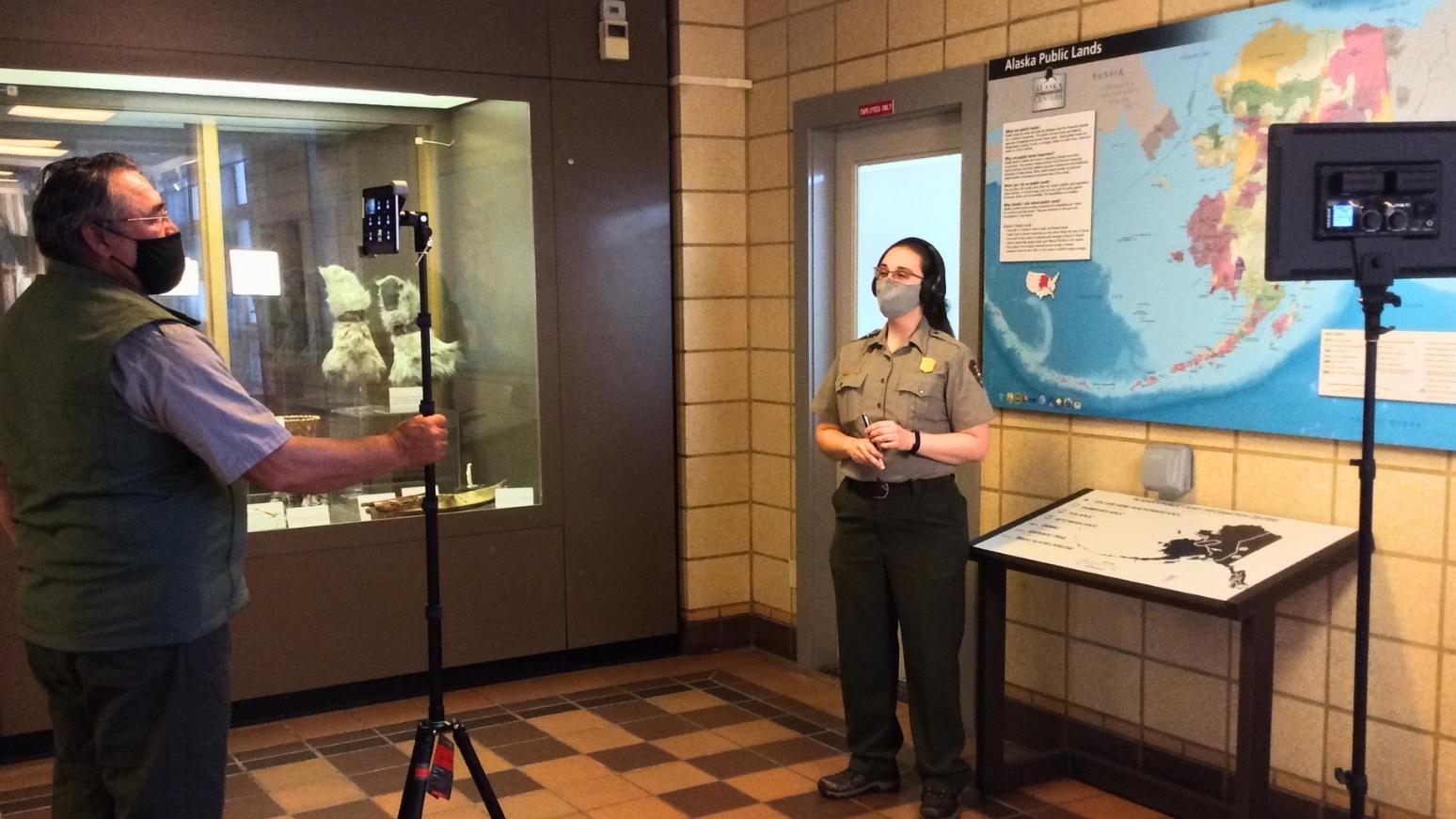 Ranger presenting Alaska map to virtual audience