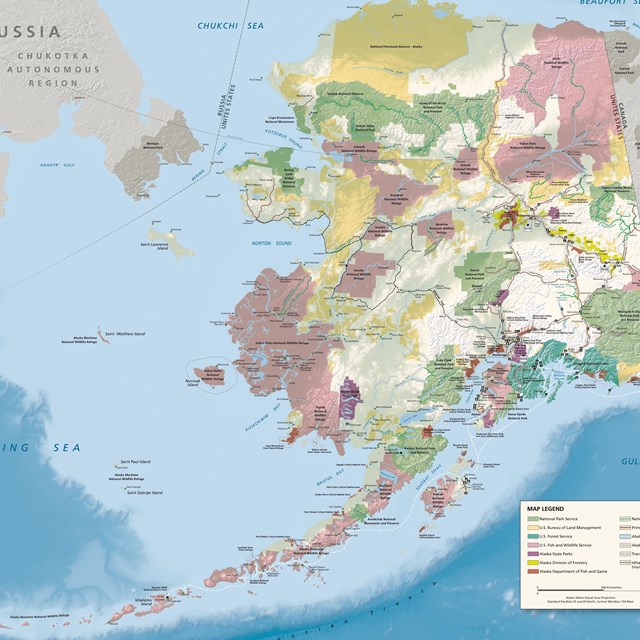 Map of Alaska in many colors.