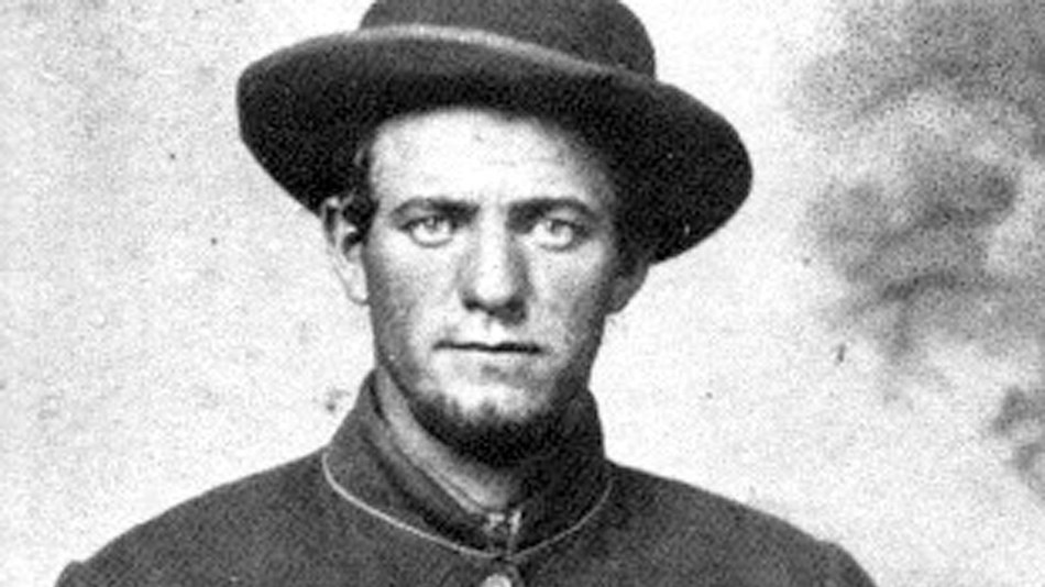 Man sitting in military uniform