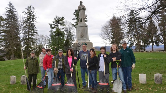 volunteers clean-up cemetery