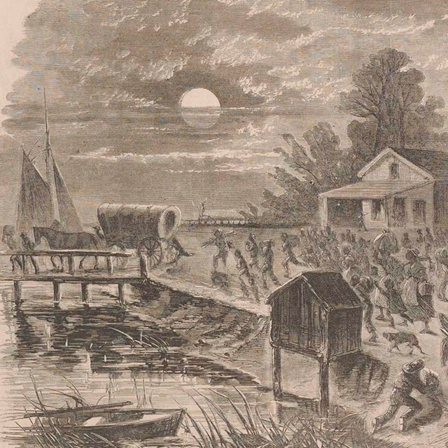 people fleeing in wagons and running