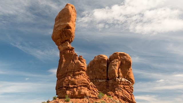 a tall, balanced rock